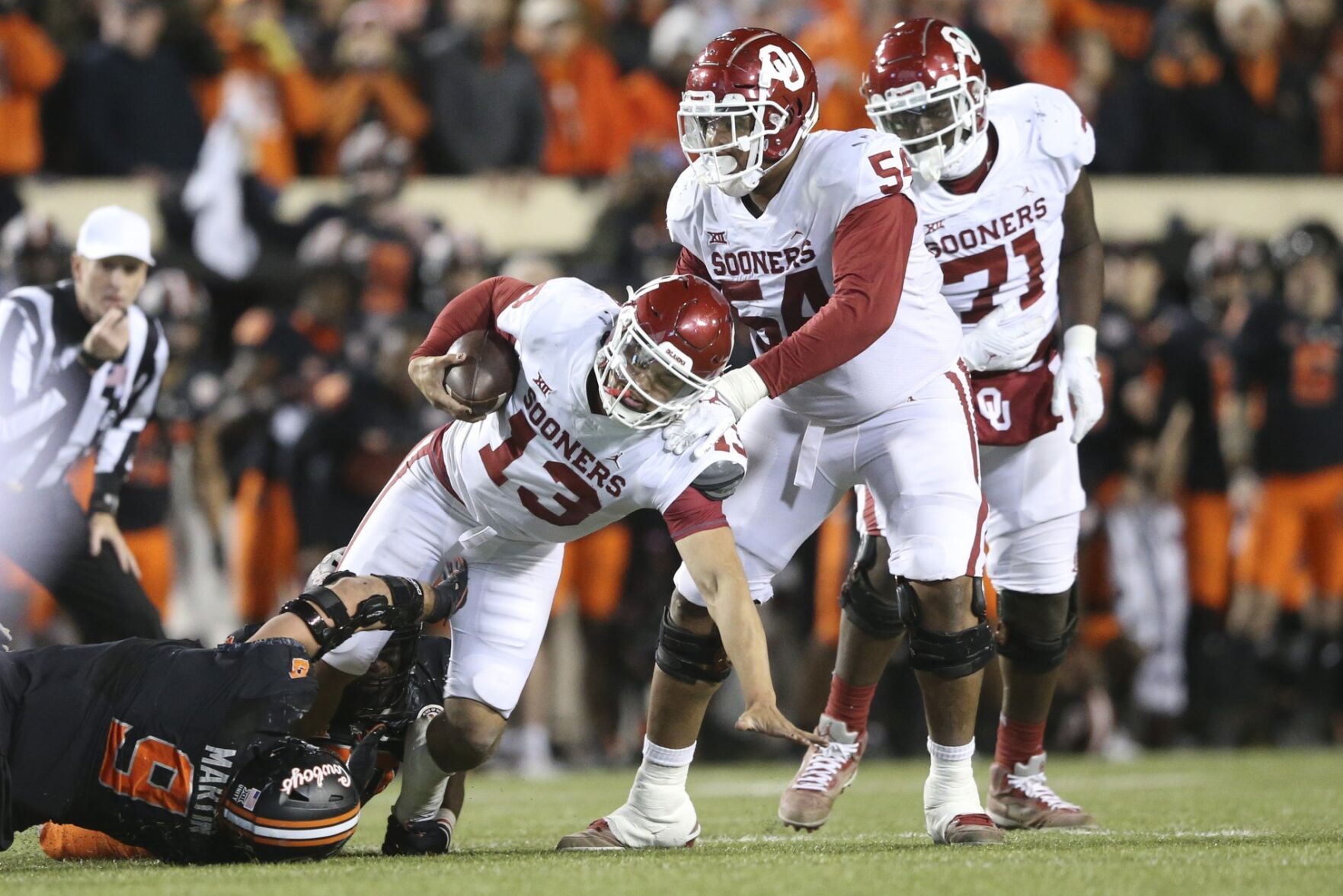 Nov. 27: OU 33, Oklahoma State 37